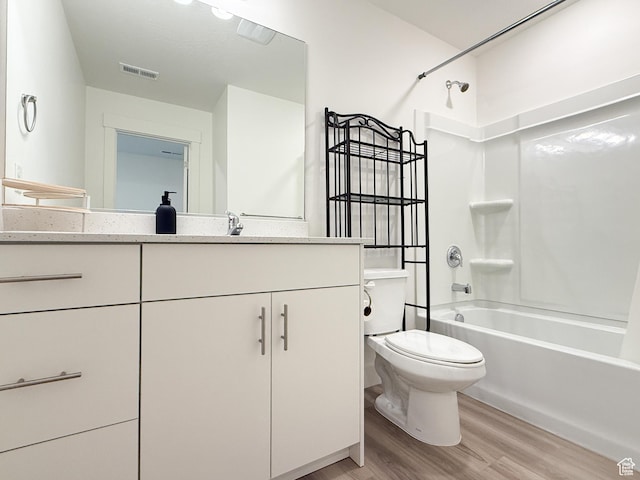 1776 N 300 E Unit 106, North Ogden, UT 84414 - bathroom with visible vents, wood finished floors, shower / washtub combination, vanity, and toilet