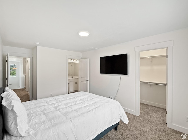 1776 N 300 E Unit 106, North Ogden, UT 84414 - carpeted bedroom featuring baseboards, a spacious closet, and a closet