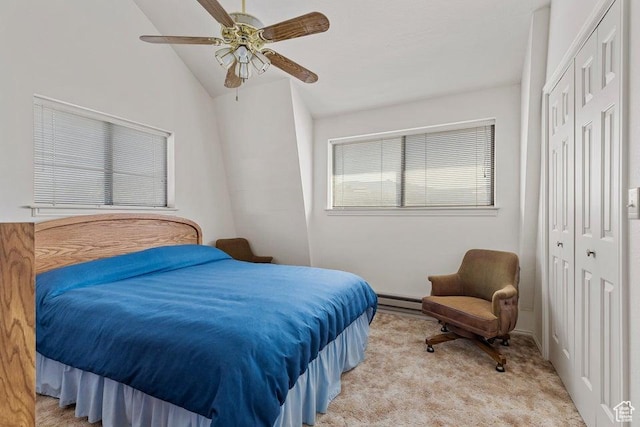 375 Hillcrest, Central, UT 84722 - bedroom featuring a closet, lofted ceiling, light carpet, a baseboard heating unit, and a ceiling fan