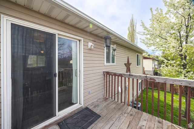 811 S Park Ave W, Logan, UT 84321 - deck with central air condition unit and a yard