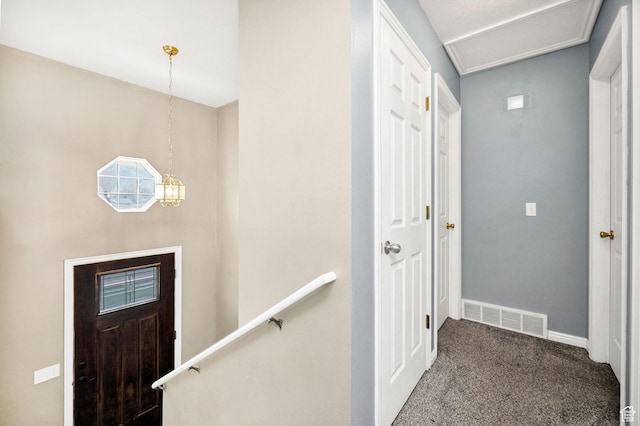 811 S Park Ave W, Logan, UT 84321 - entryway with carpet floors, baseboards, and visible vents