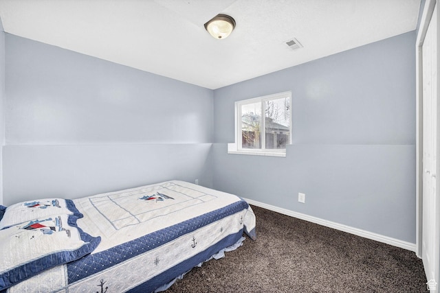 811 S Park Ave W, Logan, UT 84321 - bedroom with carpet floors, baseboards, and visible vents