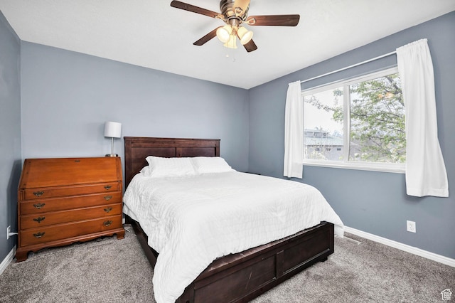 811 S Park Ave W, Logan, UT 84321 - carpeted bedroom with baseboards and a ceiling fan