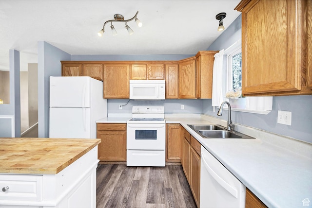 811 S Park Ave W, Logan, UT 84321 - kitchen with a sink, dark wood-style flooring, white appliances, and butcher block countertops