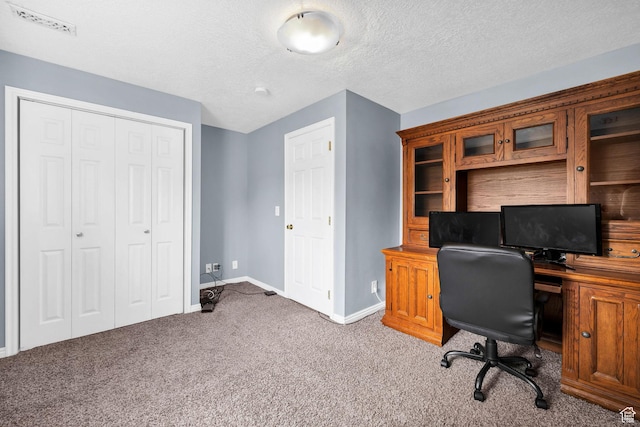 811 S Park Ave W, Logan, UT 84321 - office featuring carpet floors, a textured ceiling, and baseboards