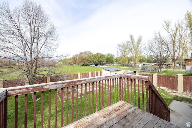 811 S Park Ave W, Logan, UT 84321 - deck featuring an outdoor structure, a yard, and a fenced backyard