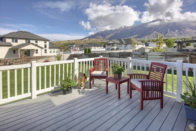 3159 N 1100 W, Pleasant View, UT 84414 - deck with a fenced backyard, a mountain view, a yard, and a residential view