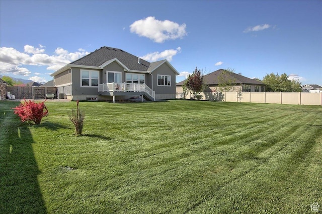 3159 N 1100 W, Pleasant View, UT 84414 - back of property featuring a yard, fence, and stucco siding