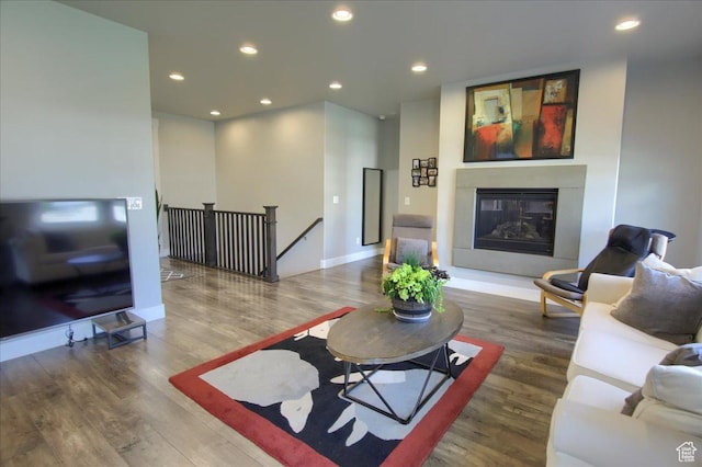 3159 N 1100 W, Pleasant View, UT 84414 - living area featuring recessed lighting, a glass covered fireplace, and wood finished floors
