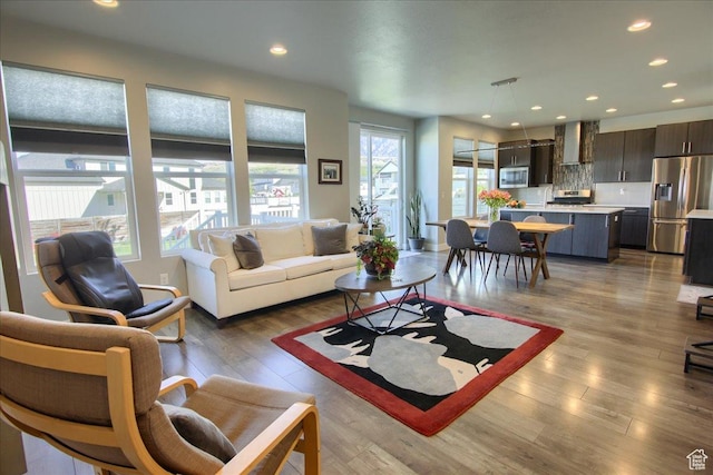 3159 N 1100 W, Pleasant View, UT 84414 - living room featuring recessed lighting and wood finished floors