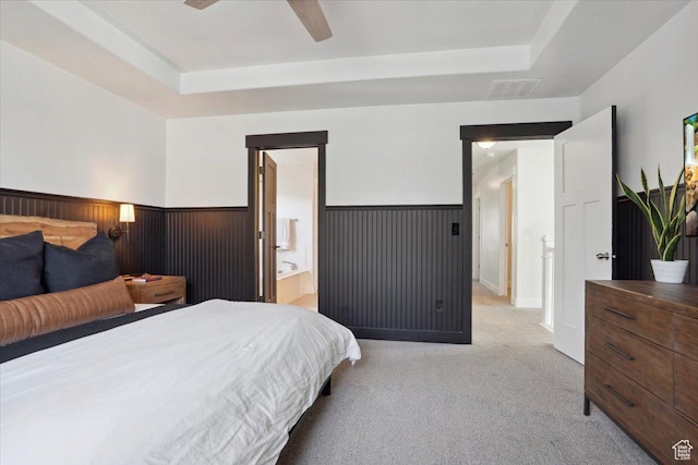 4101 W 1850 N, Lehi, UT 84043 - bedroom featuring a wainscoted wall, visible vents, light carpet, and a raised ceiling