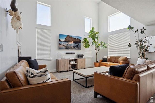 4101 W 1850 N, Lehi, UT 84043 - living room with baseboards, light carpet, and a towering ceiling
