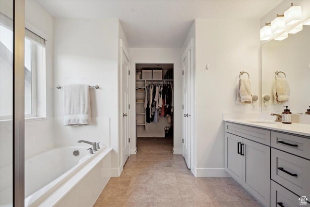 4101 W 1850 N, Lehi, UT 84043 - full bath featuring a bath, vanity, a spacious closet, and a wealth of natural light
