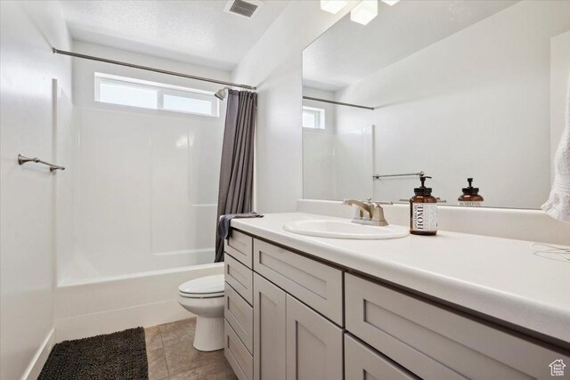 4101 W 1850 N, Lehi, UT 84043 - full bathroom featuring a healthy amount of sunlight, visible vents, tile patterned flooring, toilet, and shower / bath combo with shower curtain