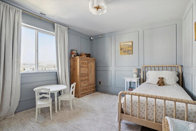 4101 W 1850 N, Lehi, UT 84043 - carpeted bedroom featuring multiple windows, a decorative wall, a textured ceiling, and visible vents