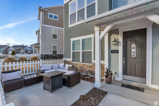 view of patio / terrace featuring fence and an outdoor living space