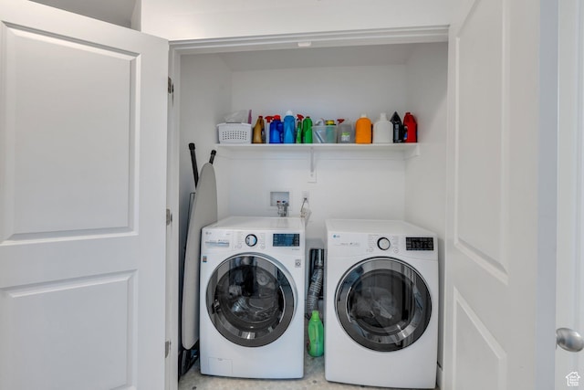laundry area featuring laundry area and washing machine and dryer