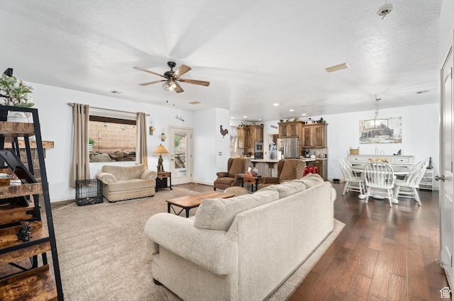 78 W Jolley Cir, Washington, UT 84780 - living area featuring visible vents, recessed lighting, a textured ceiling, a ceiling fan, and dark wood finished floors