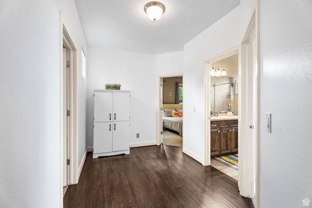 78 W Jolley Cir, Washington, UT 84780 - hallway with baseboards and dark wood-type flooring