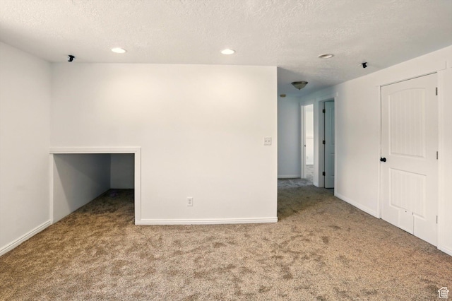 680 S Riverwalk Pkwy W, Logan, UT 84321 - carpeted spare room featuring recessed lighting, a textured ceiling, and baseboards