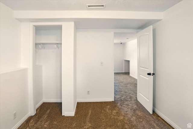 680 S Riverwalk Pkwy W, Logan, UT 84321 - unfurnished bedroom with carpet flooring, baseboards, visible vents, and a closet