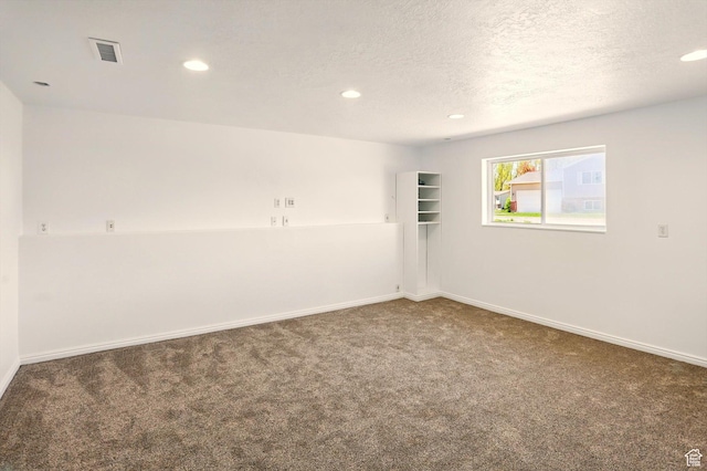 680 S Riverwalk Pkwy W, Logan, UT 84321 - carpeted spare room with visible vents, recessed lighting, a textured ceiling, and baseboards