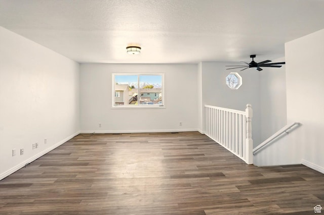 680 S Riverwalk Pkwy W, Logan, UT 84321 - spare room featuring baseboards, ceiling fan, and wood finished floors
