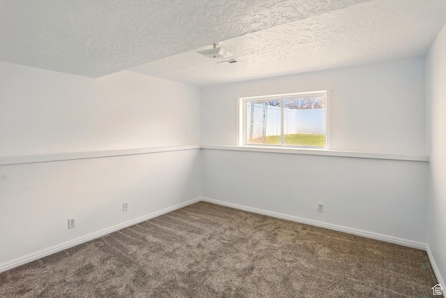 680 S Riverwalk Pkwy W, Logan, UT 84321 - empty room featuring baseboards, carpet flooring, and a textured ceiling