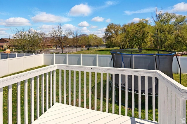 680 S Riverwalk Pkwy W, Logan, UT 84321 - wooden deck featuring a lawn and a fenced backyard