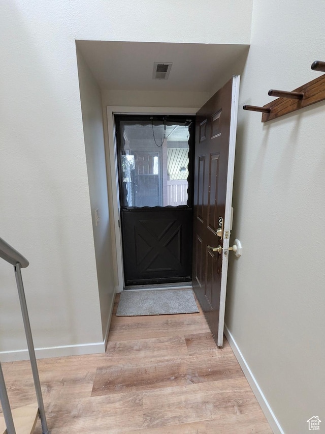 6871 N 2200 W Unit 8L, Park City, UT 84098 - entryway featuring baseboards, light wood finished floors, and visible vents