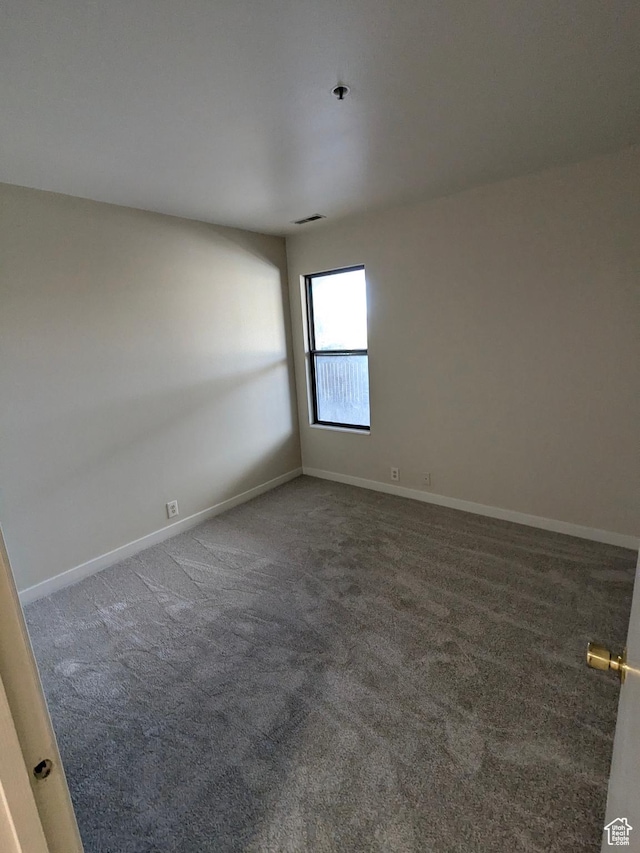 6871 N 2200 W Unit 8L, Park City, UT 84098 - carpeted spare room featuring baseboards and visible vents