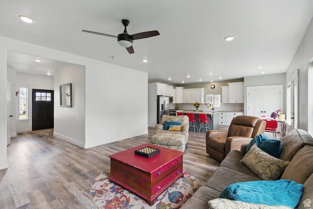 2471 W Anne Ave, West Haven, UT 84401 - living area featuring a ceiling fan, baseboards, recessed lighting, and light wood-style floors