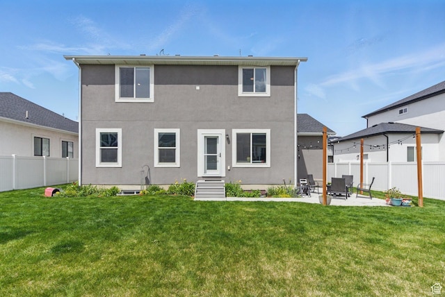 2471 W Anne Ave, West Haven, UT 84401 - rear view of house with stucco siding, fence, and a yard