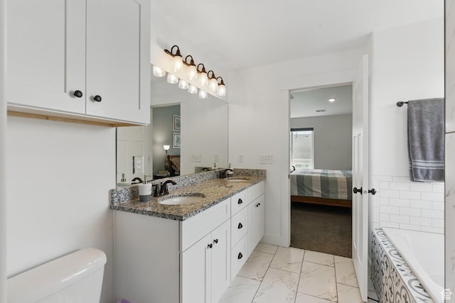 2471 W Anne Ave, West Haven, UT 84401 - bathroom featuring a sink, toilet, marble finish floor, and connected bathroom