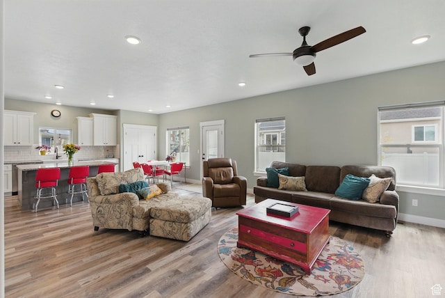 2471 W Anne Ave, West Haven, UT 84401 - living area featuring recessed lighting, baseboards, a ceiling fan, and light wood-type flooring