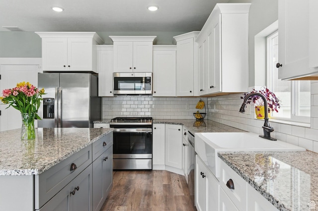 2471 W Anne Ave, West Haven, UT 84401 - kitchen featuring appliances with stainless steel finishes, white cabinets, and gray cabinetry