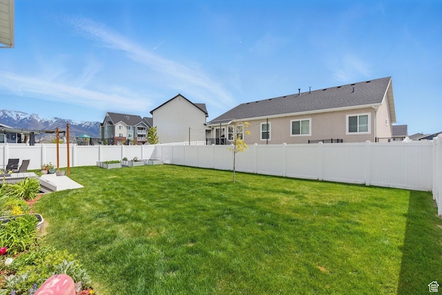 2471 W Anne Ave, West Haven, UT 84401 - view of yard with a fenced backyard and a mountain view