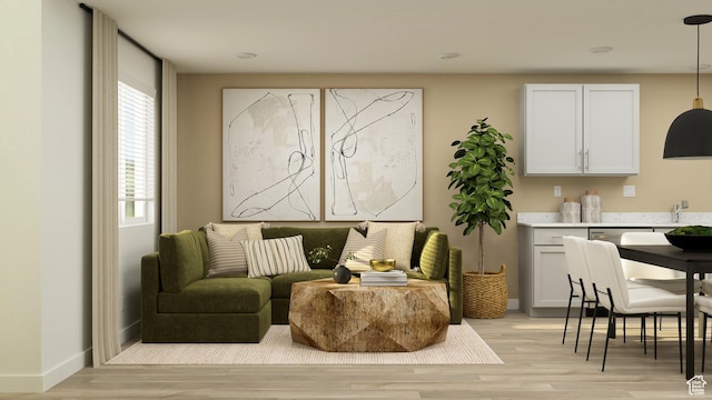 207 N Madison Ave E Unit 124, Santaquin, UT 84655 - sitting room with light wood-style flooring and baseboards