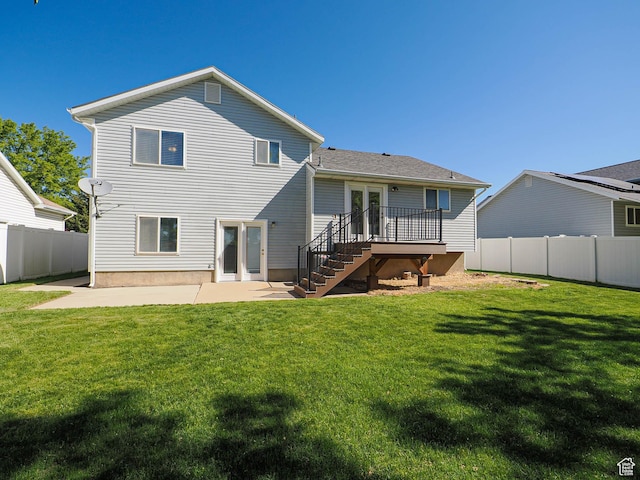 2777 W 1100 N, Layton, UT 84041 - back of house featuring a wooden deck, a fenced backyard, a patio area, a yard, and stairway