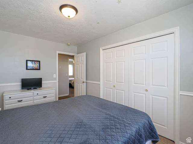 2777 W 1100 N, Layton, UT 84041 - bedroom with a closet and a textured ceiling