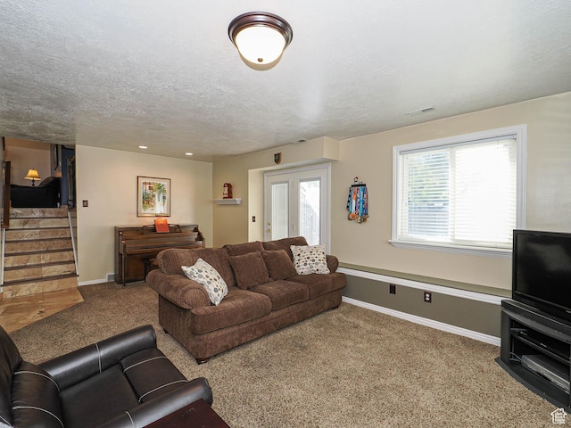 2777 W 1100 N, Layton, UT 84041 - carpeted living area featuring stairs, a textured ceiling, and baseboards