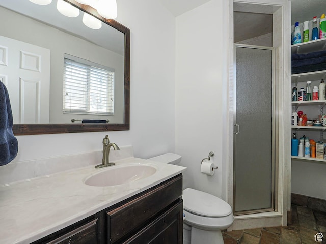 2777 W 1100 N, Layton, UT 84041 - full bathroom featuring vanity, a shower stall, toilet, and stone tile floors