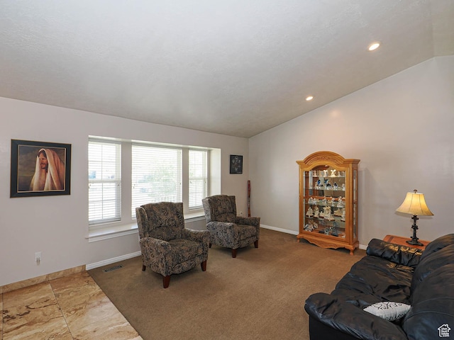 2777 W 1100 N, Layton, UT 84041 - carpeted living room featuring baseboards, visible vents, and lofted ceiling
