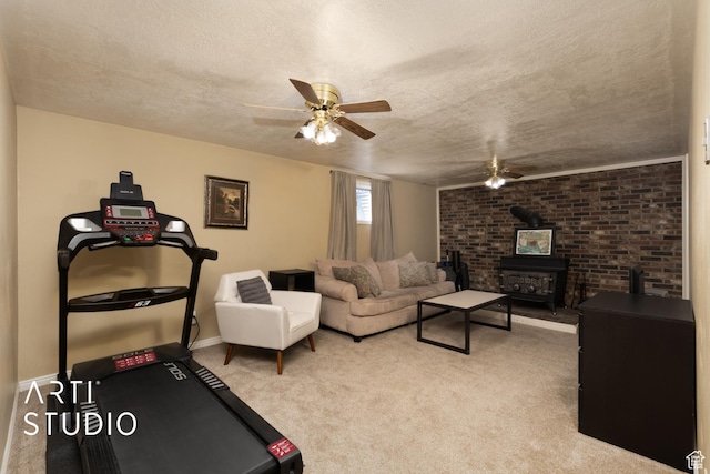 970 N 500 E, Pleasant Grove, UT 84062 - exercise room featuring a wood stove, a textured ceiling, carpet, a ceiling fan, and baseboards