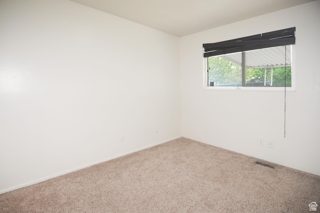 536 S Brinker E, Ogden, UT 84404 - spare room featuring carpet floors and visible vents