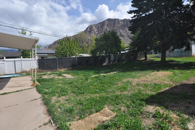 536 S Brinker E, Ogden, UT 84404 - view of yard with a mountain view and fence
