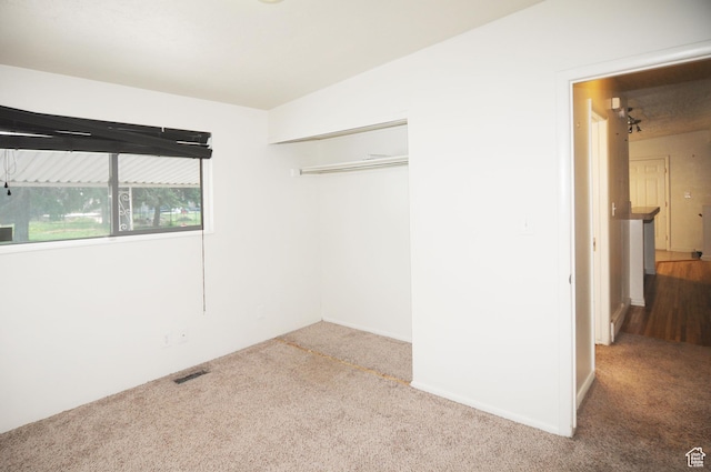 536 S Brinker E, Ogden, UT 84404 - unfurnished bedroom with carpet, a closet, and visible vents