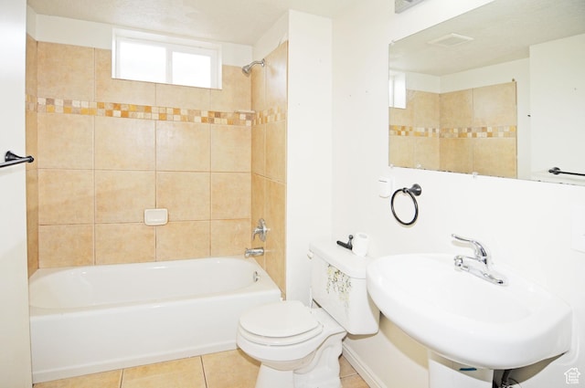 536 S Brinker E, Ogden, UT 84404 - bathroom featuring tile patterned flooring, a sink, tub / shower combination, and toilet