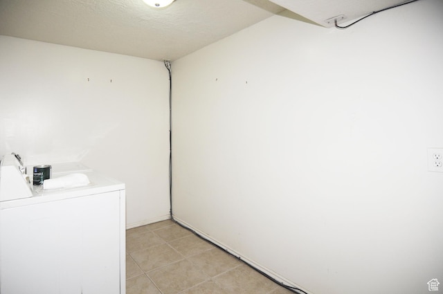 536 S Brinker E, Ogden, UT 84404 - laundry area featuring washer / clothes dryer, laundry area, and light tile patterned floors
