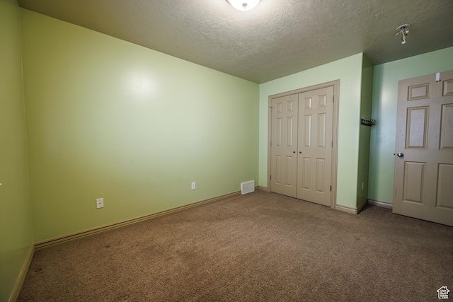 680 Stonne Ln, Kaysville, UT 84037 - unfurnished bedroom featuring visible vents, a closet, baseboards, a textured ceiling, and carpet